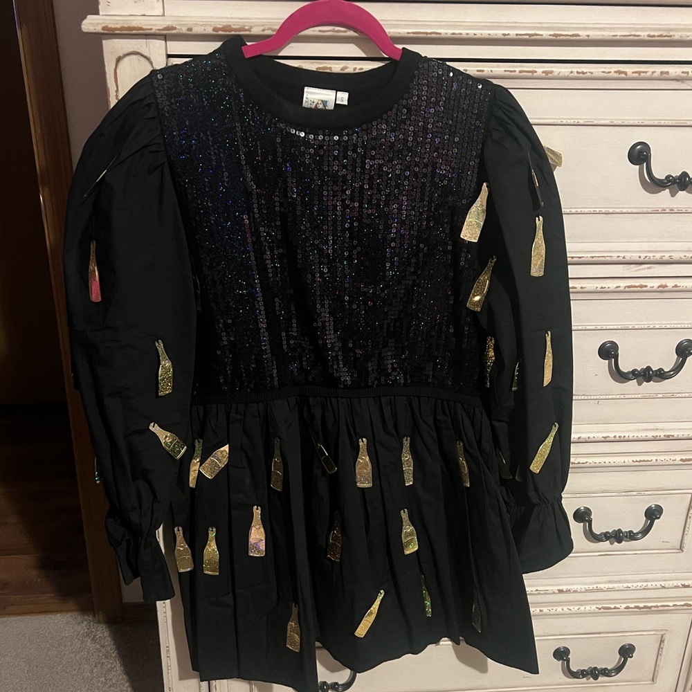 Queen of sparkles, champagne bottles ,mini dress